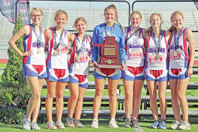 Victoria Barton, Cobie Rickner, Emily Horn, Leah Brannon, Grace Myers, Cassie Wright and Shayla Peery - Chandler’s academic state champion cross-country team.