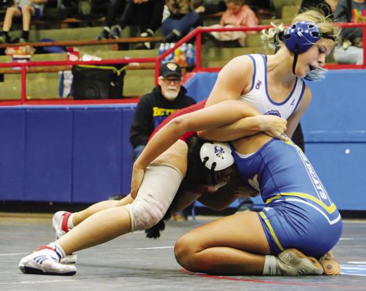 Chandler hosted Bethel in a wrestling dual last week. Working their opponents are (above) Lizzy Pryor, Brylee Waldman (left) and Brody Waldman (below). Photos/ Jennifer Pryor