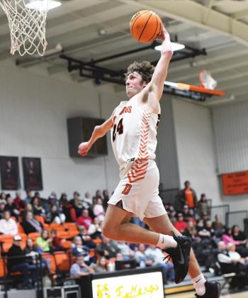No limits Hayden Brooks throws down one of 10 dunks he had in Davenport’s recent win over Olive in the Davenport Hardwood Classic. Photo/Brian Blansett