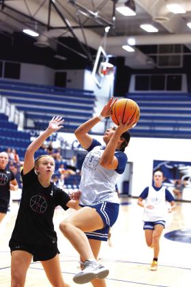 Miyah Clark goes for a layup. Photo/Beth Young