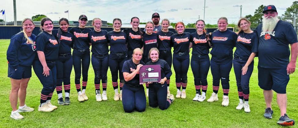 Davenport’s Lady Bulldogs pose with their plaque from the regional tournament and will play in the Class A state tournament Wednesday afternoon.
