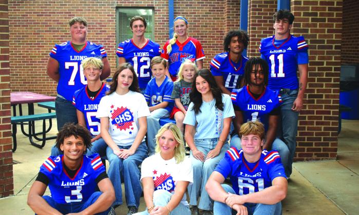 The 2026 Football Homecoming Court poses outside Chandler High School. Homecoming is this Friday at Joe Telford Field. Seated are seniors Darius Wade, Lizzy Kliewer and Boston Christy; on the left are juniors Colt Wilson, Karson Wilson and Shylee Almand; on the right are sophomores Gracie Dawley, Josiah Tillis and Peyton Arms; standing at the back are seniors Clayton Ritchie, Blaklei Smith and Jordon Dension; the littles in the middle are Canaan Gray and Avery Mackey. Photo/Emily Kalka