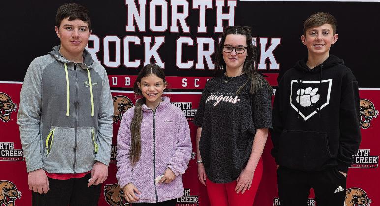North Rock Creek Middle School Students of the Month sponsored by Canadian Valley Electric Cooperative. From left to right they are: 7th graders Dylan Hoover and Olivia Barger, and 8th graders Grace Hobbs and Eli Nemecek.