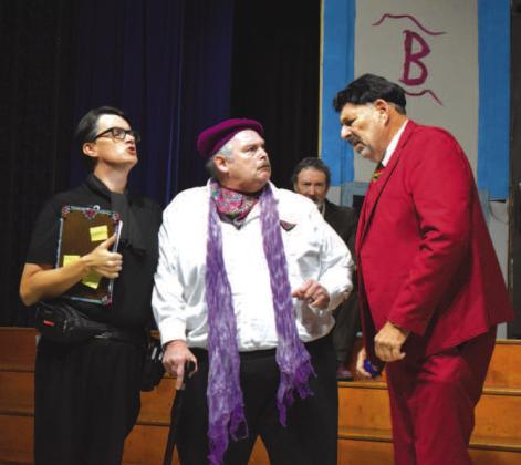 Chevy Carter (left) stands up to Brett Anderson (right) with Howard Houston. Photo/ Emily Kalka