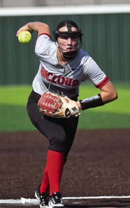 Meeker southpaw Macy Jones, left, and McLoud’s Ella Smith worked in the circle in Monday’s season-opener at the Ballfields at Firelake. Smith and McLoud emerged with the win, taking a 6-1 decision. Photos/Brian Blansett