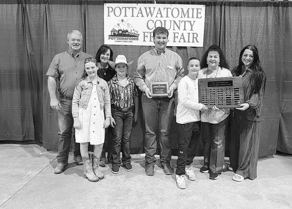 Ann “Sis” Gilbert Outstanding Youth Fair Exhibitor Gus Goodson (L-R). Randy Gilbert, Taycie Baker, Dustie Baker, Bryar Baker, Gus Goodson- North Rock Creek FFA (2024) Legend Baker, Suzanne Gilbert and Annie Jo Gilbert