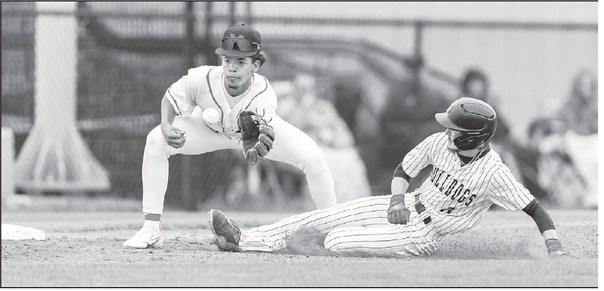Meeker’s Jason Key slides safely into third against Morrison last week. Photo/Rick Hester
