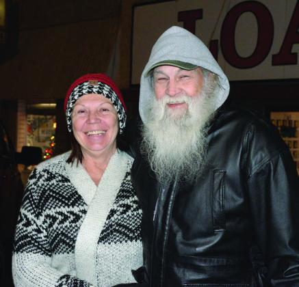 The Chandler parade featured everything from possible holiday celebrities in civilian clothes to trick ropers to the Chandler High School band to Santa Claus hitching a ride on a front end loader. Photos/Brian Blansett