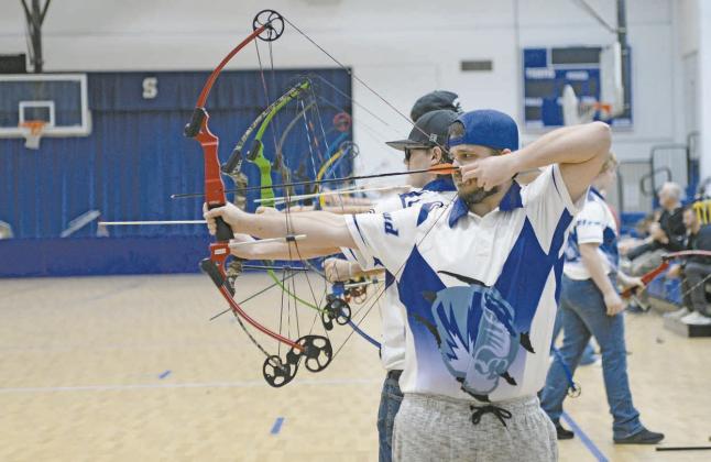 Photos: At the top, Delaney Bernal from Stroud takes aim during the bullseye competition on Thursday morning at the Colesium. Photo/ Emily Kalka Next to that, a line of archers aims at the bullseye during the Stroud Archery Tournament on Thursday. Photo/Emily Kalka Below that, Hunter Leathers pulls out his arrows during the 3D competition. Photo/Beth Young At the bottom, Connor Carmell and Louis Greene from Stroud compete in the 3D tournament on Friday. Photo/Brian Blansett