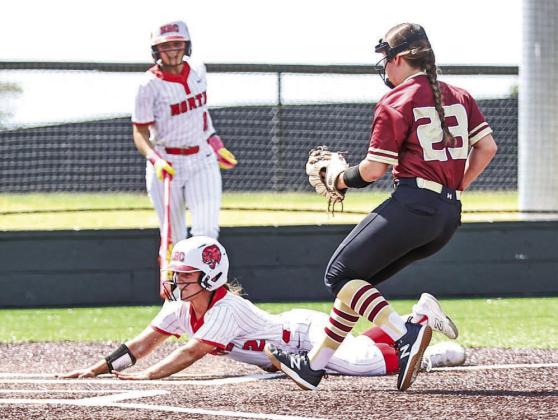 Jaden Clifton slides in safely at home on a wild pitch during North Rock Creek’s district 16-6 win over Cleveland. Photo/Sheryl Gowin