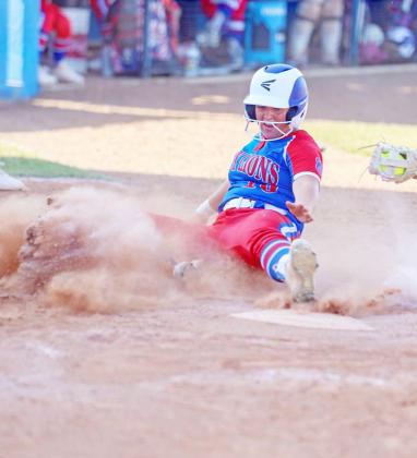 Rylee Capps slides home Monday during Chandler’s 9-3 district win over Sperry. The Lady Tigers are 20-1 on the season and clinched the District 3A-7 championship with the victory. they played Prague on Tuesday and then went to the Oktaha tournament. Photo/Mario Holland