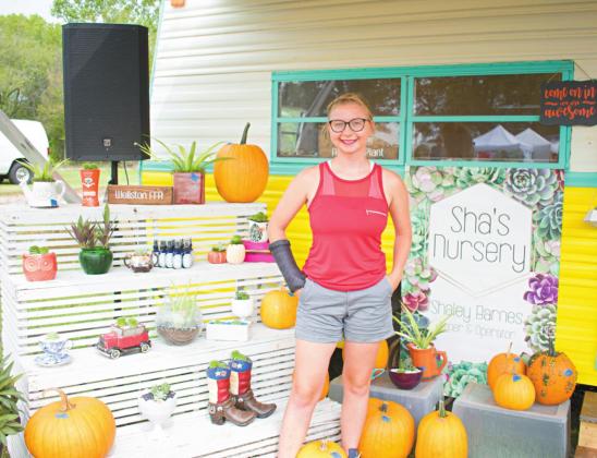 Above, Shaley Barnes stands outside her travel trailer at the Old Chicken Farm Fall Show Saturday, Sept. 12. Photo/Chelsea Weeks.