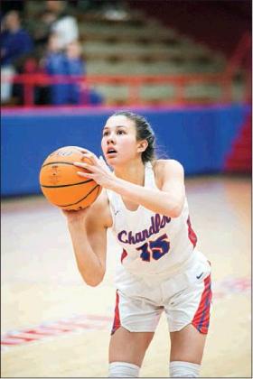 left, Presley Martzall prepares to shoot a free throw in the fourth quarter. Photos/Brian Blansett