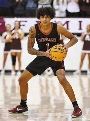 NRC’s Memphis Burdine looks to pass the ball during the Cougars’ run to the championship at the Chickasaw East Central Oklahoma Classic in Ada. Photo/Sheryl Gowin
