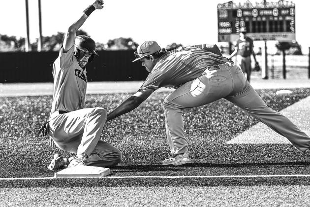 Kason Johnston from North Rock Creek High School puts the tag on the Cushing runner. The NRC baseball team came out on top on June 16, beating Cushing 10 to 9 and improving their record to 4-2 in the summer league. Photo/Sheryl Gowin