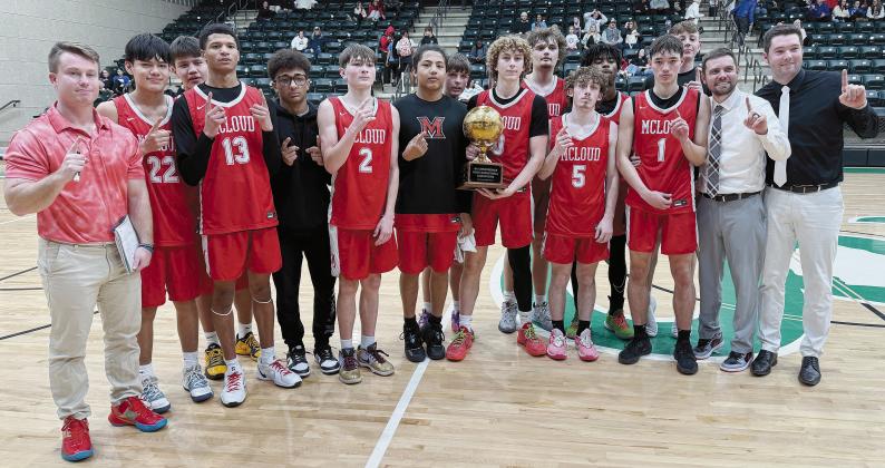 1,000-point mark for his career. Below, the tournament champion, McLoud Redskins. Photos/Brian Blansett
