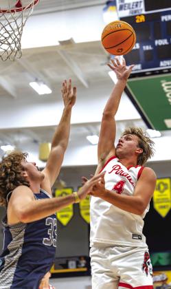 Jett Higdon goes for the high release to get two points. Photo/Rick Hester