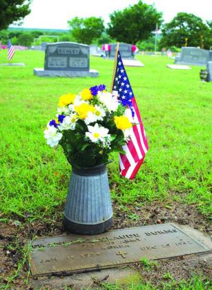 Above is a view of New Zion Cemetery located between Chandler and Davenport on Memorial Day. The cemetery is filled with flowers and flags commemorating the holiday. Photo/Emily Kalka