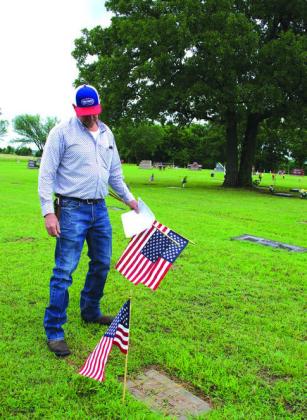 Above is a view of New Zion Cemetery located between Chandler and Davenport on Memorial Day. The cemetery is filled with flowers and flags commemorating the holiday. Photo/Emily Kalka