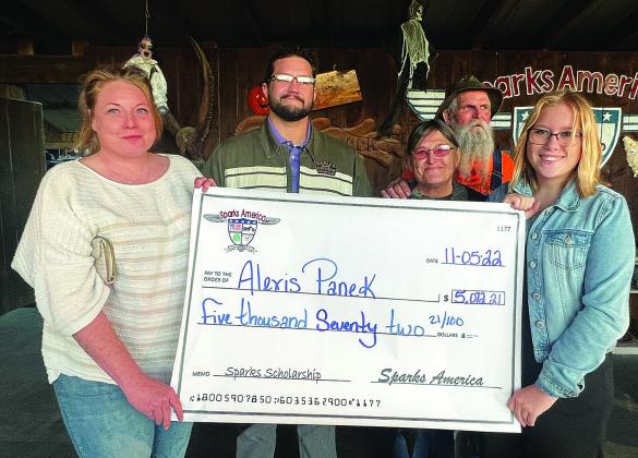 Sparks America recently awarded $5,072 scholarships to Laryssa Nunn of Chandler High School and Alexis Panek of Perkins High School. The money is raised at rallies throughout the year.