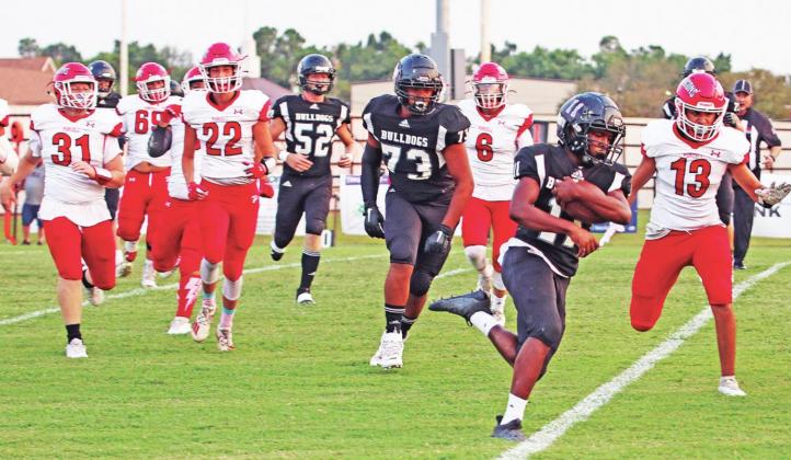 Kevin Grady scores for Meeker against Purcell. Photo/Traci Cook