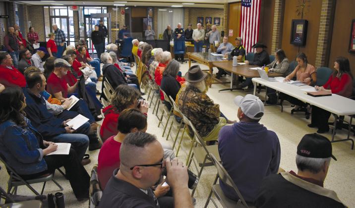 Residents of Lincoln County attend the County Commissioners Meeting on March 18. Commissioners Will Fine, Lee Doolen and Marlon Miller allotted 30 minutes of the meeting to discuss proposed wind farms and steps the commissioners could legally take against them. They told the gathered residents that if they brought in a successful petition, they would hold an election on zoning and vote on a moratorium on wind and solar energy in the county. Photo/Emily Kalka