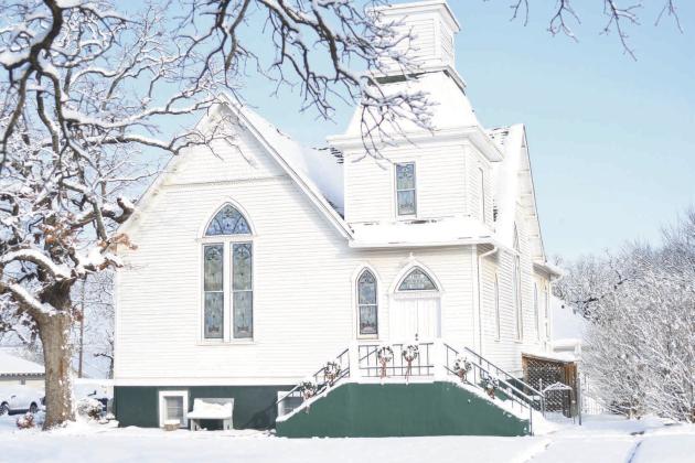 Lincoln and Pott counties looked different after the snowfall last week. Avove, the snow added a Currier &amp;amp; Ives touch to the always-photogenic First Presbyterian Church, just off downtown. Below left, Bell Cow Creek turned to slush in Tilghman Park and, below right, Billy Buoy kept himself warm shoveling snow from in from in front of L.E.’s Burgers in Meeker. Photos/Brian Blansett