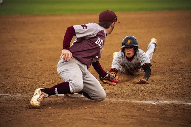 Wellston moved its record to 5-2 on the year with a pair of wins in the Crescent tournament last week. Left, Kade Johnson delivers a pitch to the plate in the WT’s 16-5 win over Oklahoma Christian. Above, freshman Wylie Terrell slides safely into third against Destiny Christian. Photos/ Jeremy Self