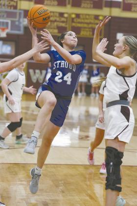 Below, Miyah Clark (24) puts up a shot for Stroud in the district game against Cashion. Photo/Beth Young.