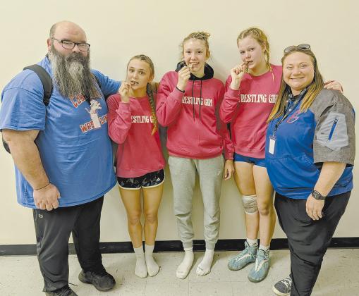 Below, Chandler’s Lizzy Pryor, Shailey Penn and Brylee Waldman, pictured below with coaches Franklin Ward and Kallie Petrie, qualified for state as well. Photos/Jennifer Pryor