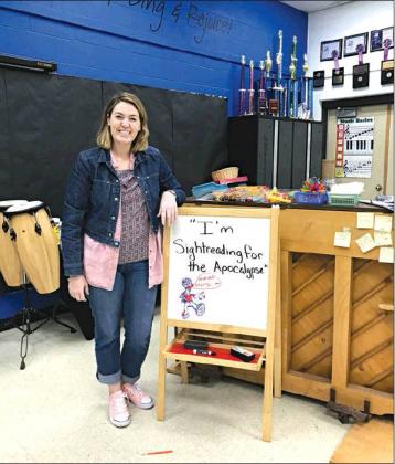Photo/Jessica Pollard Choir director Laura Watson encourages her students to learn sightreading by pretending it is the apocalypse. If all the music teachers were zombies and all the pianos exploded, students would have to rely on their own ability to sing.