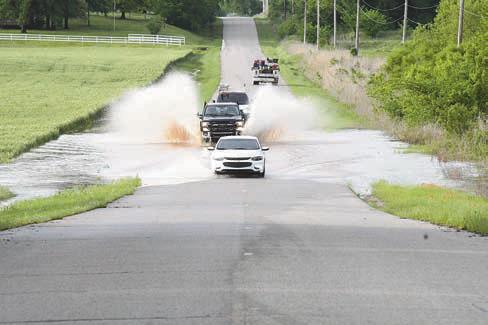 Two deaths reported, dozens of roads closed