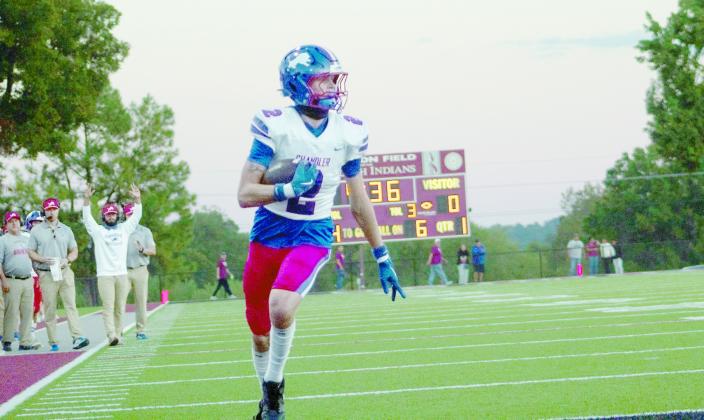 Coniah Ritchie motors into the end zone for Chandler’s first score Friday. Photo/Shailey Penn
