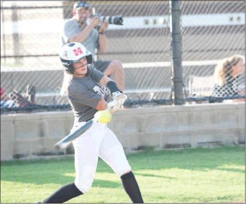 Meeker’s Callie Sellers connects against Luther last week. Photo/Brian Blansett