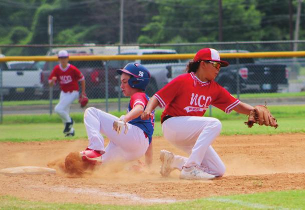 Pictured above and to the right, Jackson Campbell slides into third base.