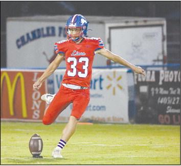 Landon Miller kicks off after one of Chandler’s seven touchdowns. Photo/Brian-Blansett