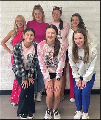Senior Aviary Helms was crowned Meeker’s Homecoming Queen Friday night before the Bulldogs’ game with Pawnee. She is shown above left with escort Bobby Brooks (69). Above right is the Homecoming court, Back Row, Senior Queen candidates Autumn Ingram, Annsley Babek, Aviary Helms and Tatum Tinsley Front Row: Freshman attendant Emmerson Gabeau, sophomore attendant Devyn Frazier and junior attendant Taylor Hannah. The top photo is of the court, escort and tiny royalty on the field after the coronation.