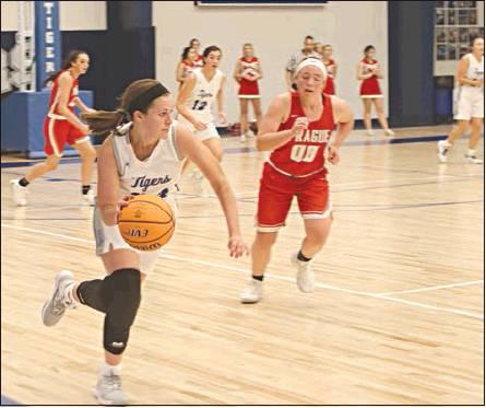 Bottom left, Katlyn Hughey advances the ball for Stroud against Prague. Photo/Tommie Marshall.