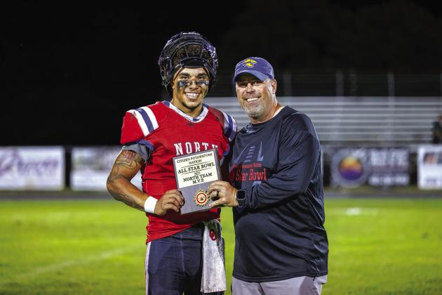 North quarterback Treyvon Compton from Meeker is named the North Team MVP. Photo/Rick Hester