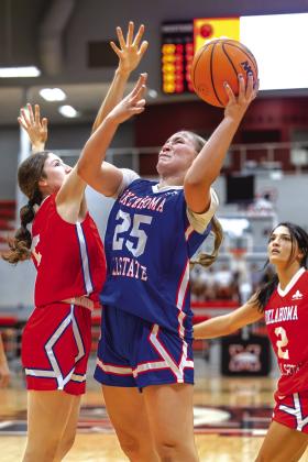 Teague Muncy goes up strong to score two points for the Small School East team. Photo/Rick Hester