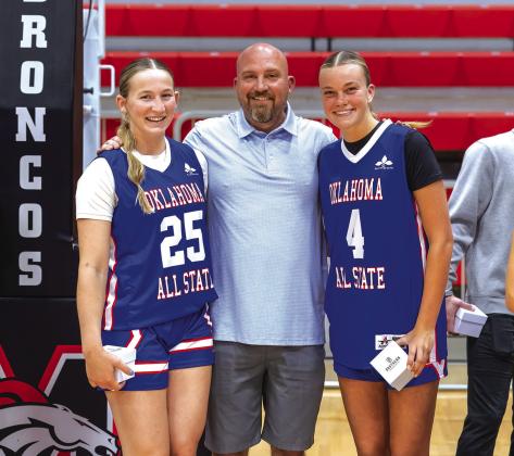 Teague Muncy, Dale Head Coach Eric Smith, Ava Bell after the pregame all-state ring presentation. Photo/Rick Hester