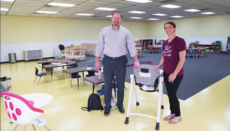 North Rock Creek Superintendent Blake Moody with Kara Fuller in the school’s new day care. Photo/Brian Blansett