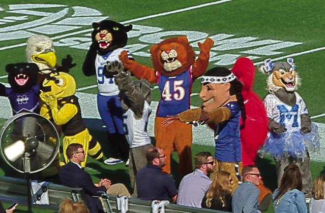 Leo the Lion (senior Ashlee Beatty), the mascot for Chandler High School, dances on the sidelines during the Cheez-It Citrus Bowl half-time show in Orlando, Florida on Jan. 1. Beatty was one of 50 mascots from high schools across the United States selected for the All-American squad and invited to perform. Musician Gavin DeGraw was the guest performer during the show. Beatty is the first mascot from CHS to make All-American.