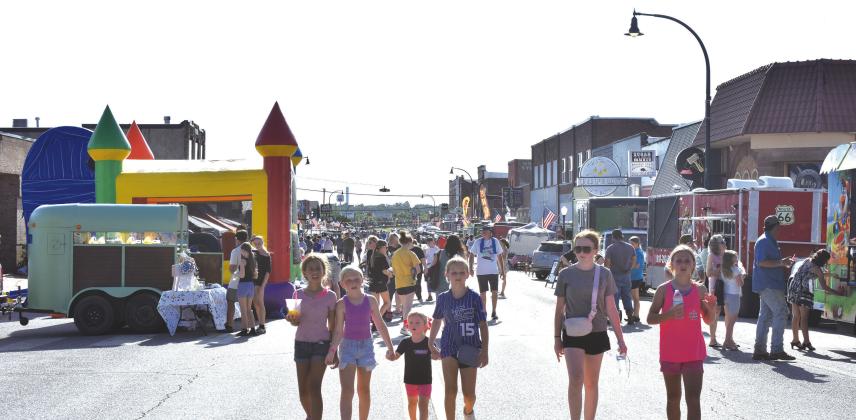 People crowd Main Street/Route 66 in Stroud for the town’s annual SummerFest on June 13. This year’s festival was bigger and better, ending with a firework display. Photo/ Emily Kalka