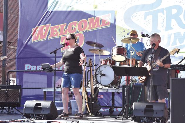 Above, a cover band takes the stage at SummerFest. Photo/Emily Kalka