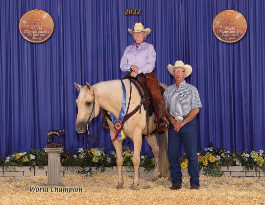 Sandy Bendele, Chandler, recently won the Select Amateur Ranch Riding world’s championship at the Palomino Horse Breeders Association world showing Springfi eld, Ill. She is pictured above with her horse, Playboys Shining, and husband Mike.