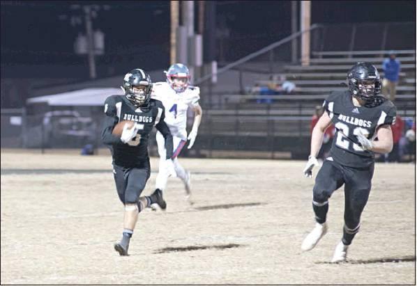 Dakota Gabbert returns a punt for a touchdown in Meeker’s romp over Oklahoma Christian School. Photo/Brian Blansett