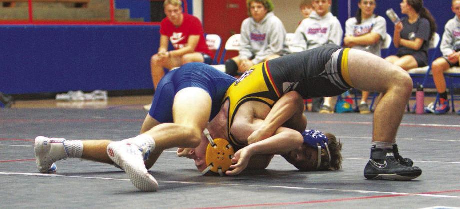 Wrestling season is in full swing for the Chandler boys and girls teams. They most recently were in action against Tecumseh. Pictured are Bryar Dryden, above; Addilyn Massey, below left; Evan Manning, below right; Julianna Stour, bottom right; and Gracie Whalin, bottom. Photos/Jennifer Pryor