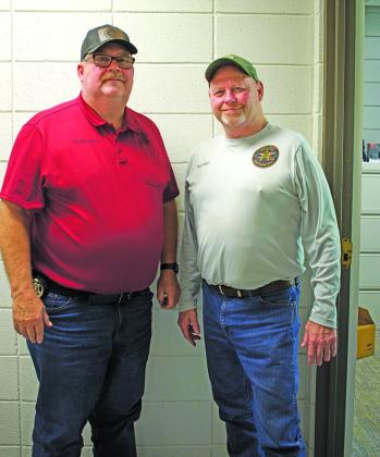 Sheriff Kevin Garrett (left) stands with Rod Baker (right) at the Lincoln County Sheriff’s Office. Photo/Emily Kalka