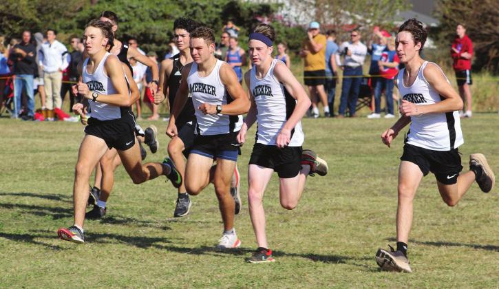 Meeker runners, from left, Riley Randall, Johnny Butler, Asa Watham, and Devin Sligar get out early at the Class 3A regional cross meet at Oklahoma Bible Academy in Enid on Saturday. Photo/Antony Earley